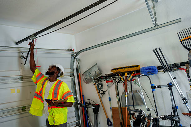 Professional Garage Door Panel Replacement technician working in Thief River Falls, MN
